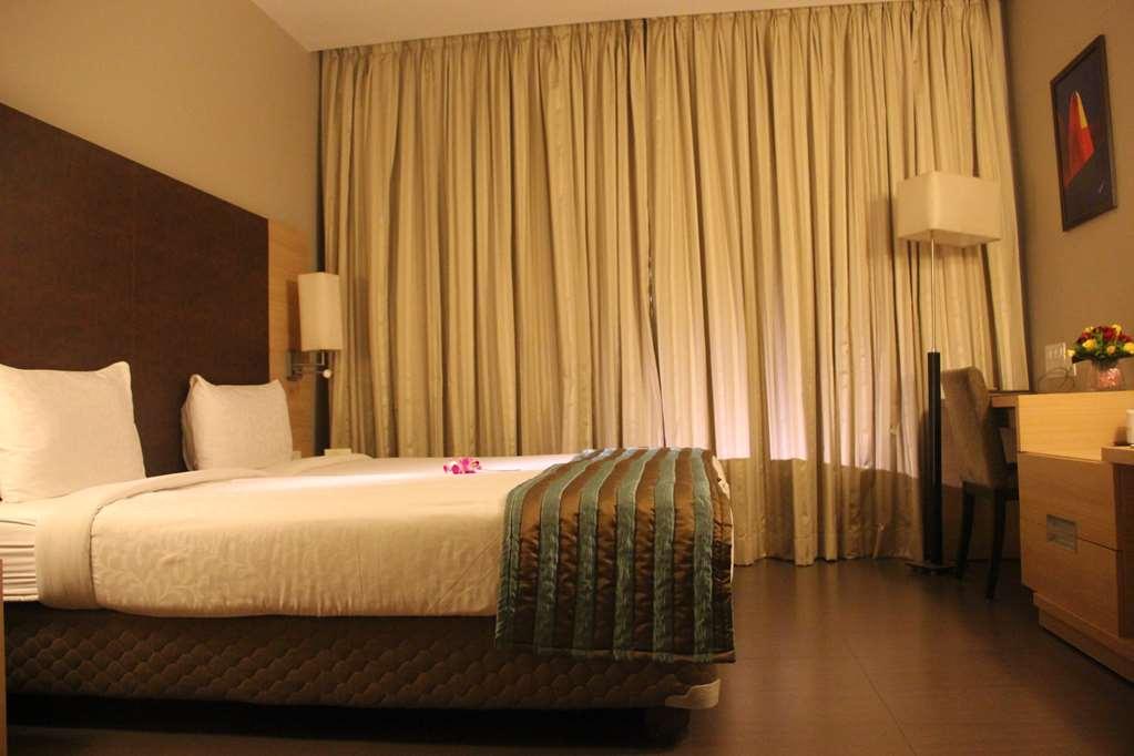 Cocoon Hotel Pune Habitación foto