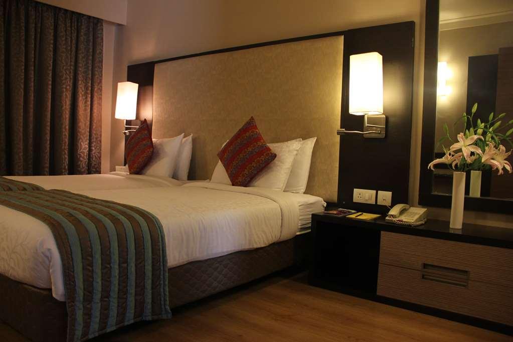 Cocoon Hotel Pune Habitación foto