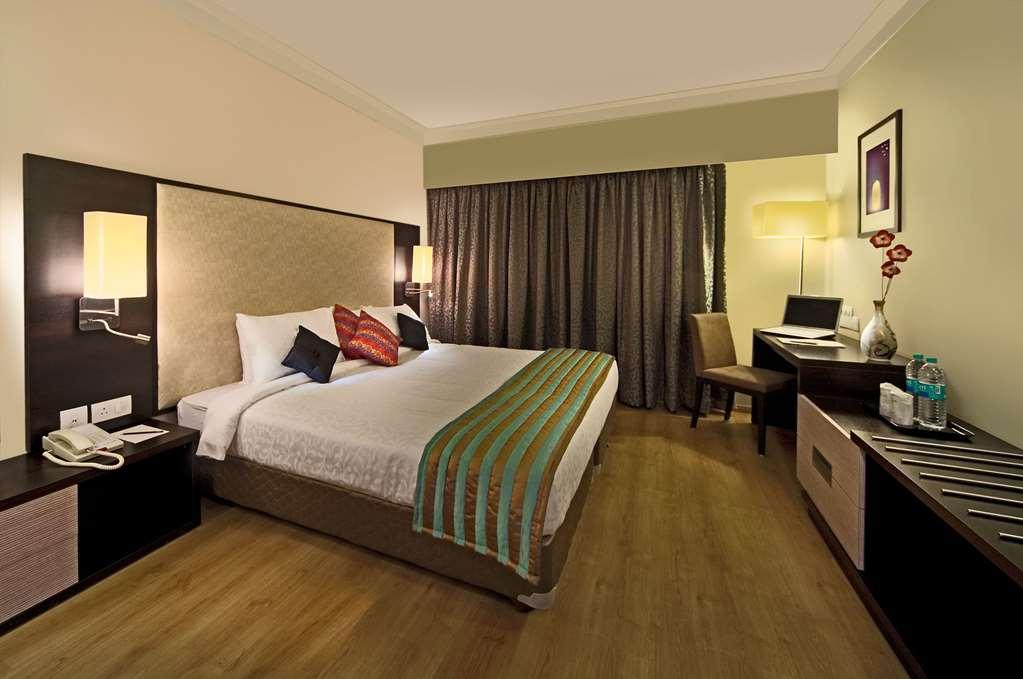 Cocoon Hotel Pune Habitación foto