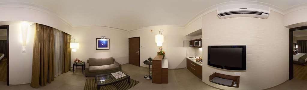 Cocoon Hotel Pune Habitación foto